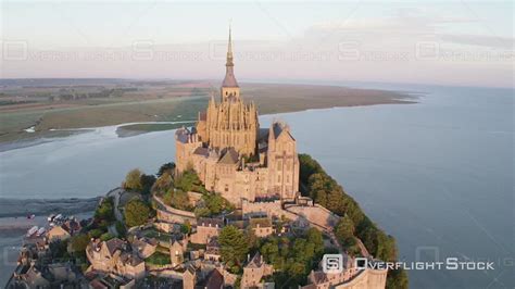 OverflightStock™ | Aerial View of the Mont Saint-michel by High Tide, Filmed by Drone at Sunrise ...