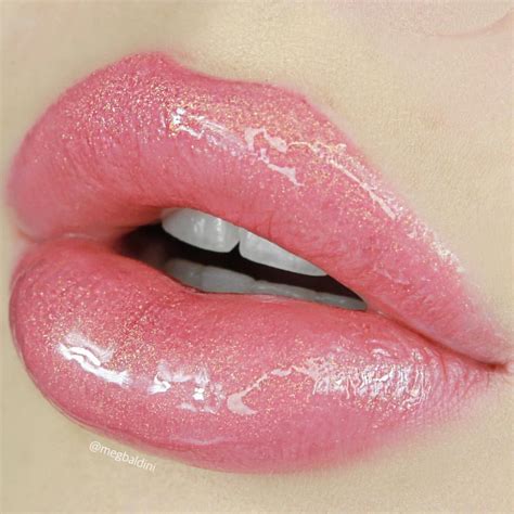 Fun fact, Lip gloss was invented by Max Factor in 1930 to make the lips look shiny or glossy for ...
