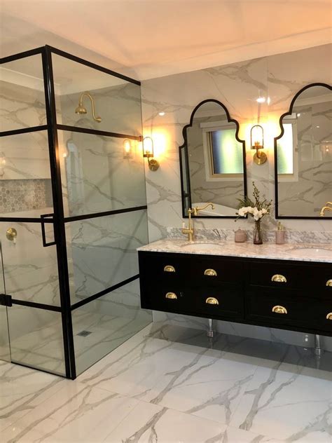 Pin by AMINATA on Interiors | Black and gold bathroom, White marble ...