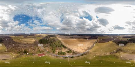 360° view of 360 degree panorama from composite aerial photos of a football field in a village ...