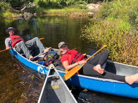 Canoe Portage With Friends: How To Have A Successful Back Country Camping Trip | Kathryn Anywhere