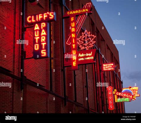 The electric neon signs of the outdoor Neon Sign Museum in Edmonton, Alberta, Canada Stock Photo ...