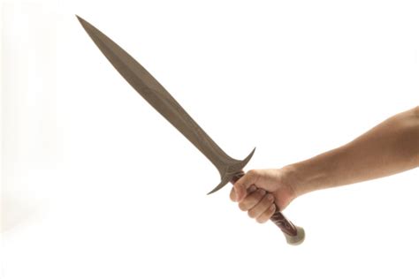 Hand Holding An Ancient Sword Stock Photo - Download Image Now - iStock