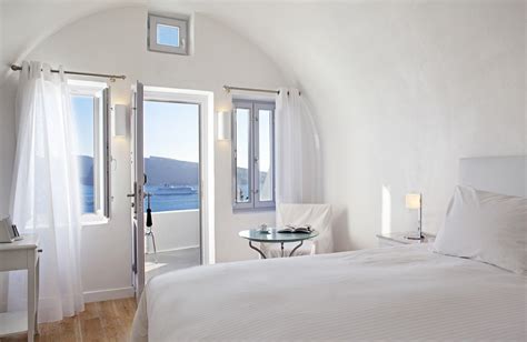 Katikies Hotel Blends Santorini’s Magical...