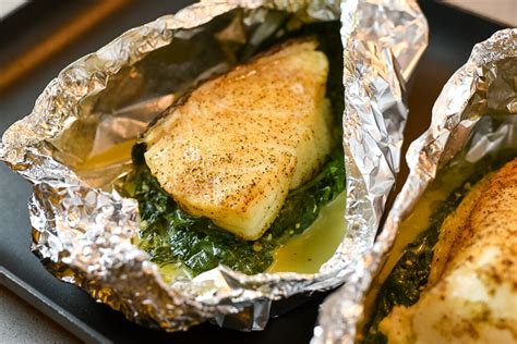 Foil Baked Chilean Sea Bass with Lemon Parmesan Cream Sauce | Dude That Cookz