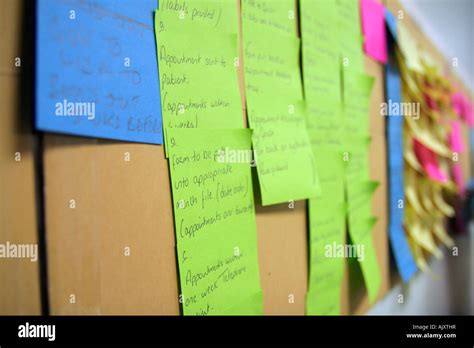 Post it notes on a wall Stock Photo - Alamy