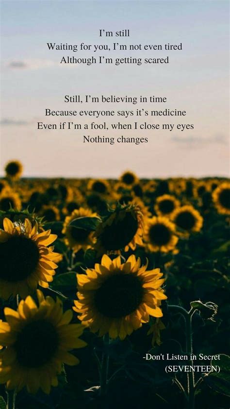 a sunflower field with the words i'm still waiting for you, i'm not even tired although i'm ...