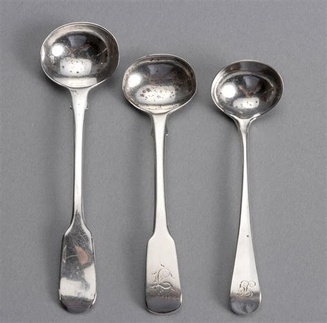 THREE SILVER SALT SPOONS, VARIOUS MAKER'S AND DATES