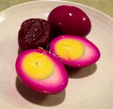 Purple pickled eggs (with beet). Mom gave me a jar for my birthday, which was a throwback to ...