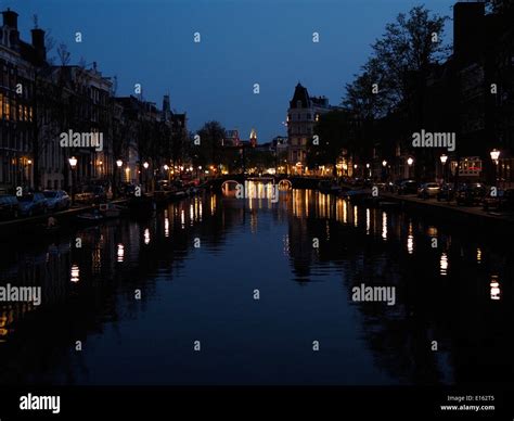 Amsterdam Canal at Night Stock Photo - Alamy