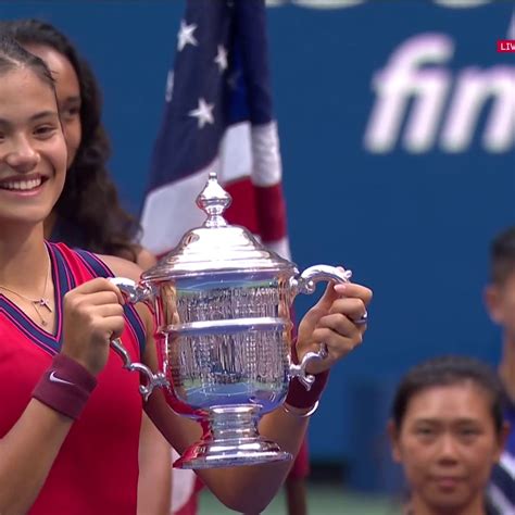 Emma Raducanu lifts the US Open trophy | woman, United States of ...