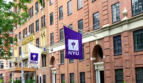 NYU banner on campus building of New York University - Manhattan, New York, USA - 2021 — The ...