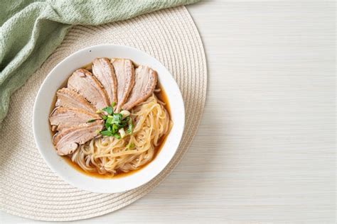 Premium Photo | Duck noodles with stewed duck soup