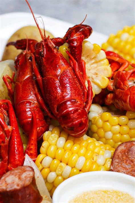 Louisiana Crawfish Boil Recipe with Garlic Butter Sauce - IzzyCooking