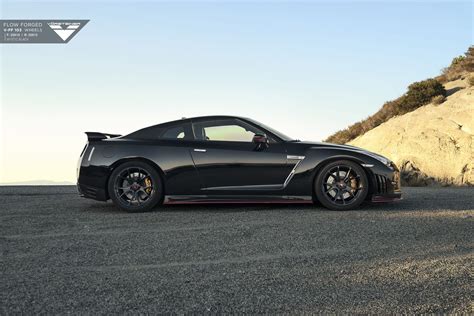 Iconic Nissan GT-R: Black and Fitted with Custom LED Headlights — CARiD.com Gallery