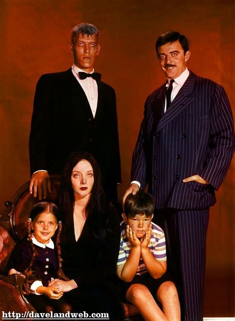 John Astin as Gomez, Ted Cassidy as Lurch, Carolyn Jones as Morticia ...