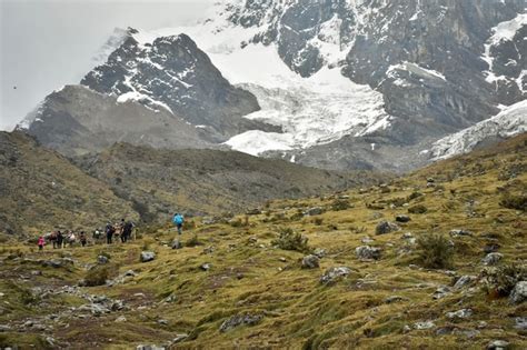 Premium Photo | A group of people hiking in the mountains