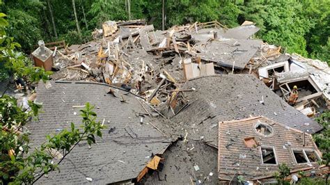 Gov. Cooper visits storm damage in Western NC