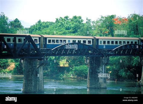 Train crossing over a river bridge hi-res stock photography and images ...