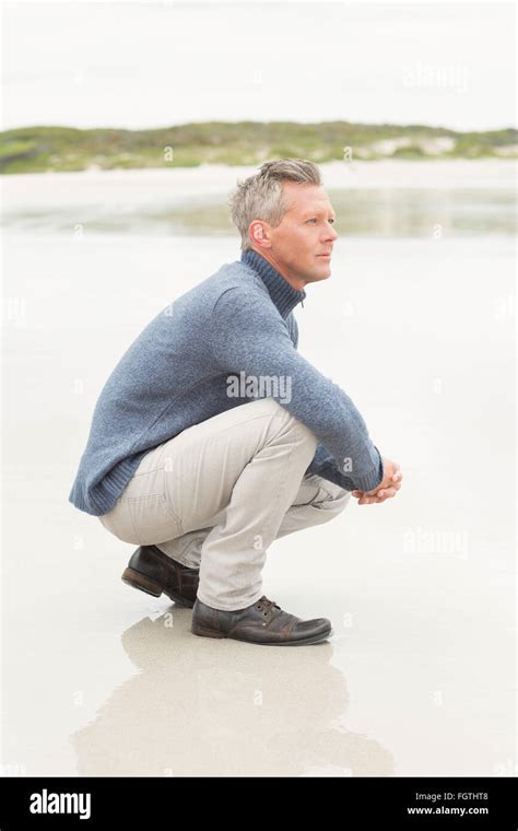 Man crouched down hi-res stock photography and images - Alamy