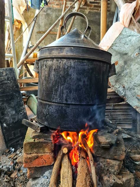 Cooking with traditional stove 27710697 Stock Photo at Vecteezy