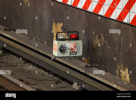 A NYC subway third rail warning device. The safety device activates flashing lights and a siren ...