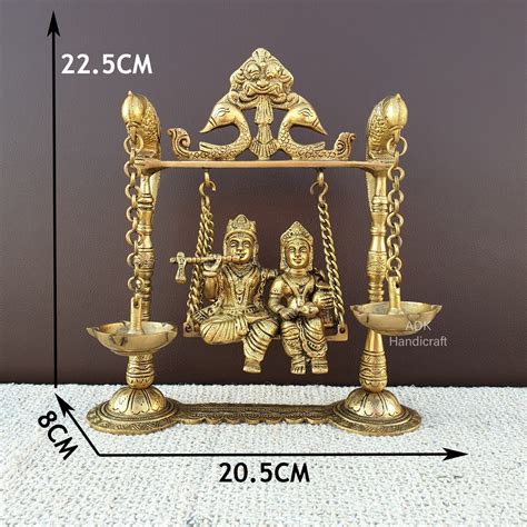 Brass Radha Krishna Statue on Swing With Diyas 9 Inch - Etsy