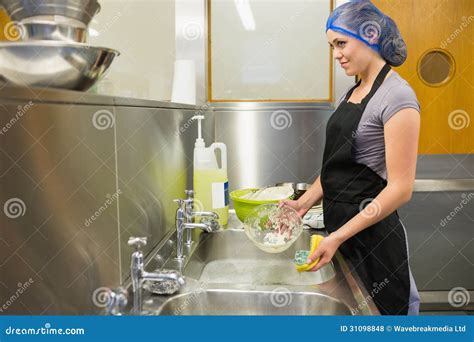 Woman Washing The Dishes Royalty Free Stock Photos - Image: 31098848