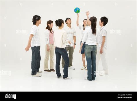 Young people standing in circle Stock Photo - Alamy