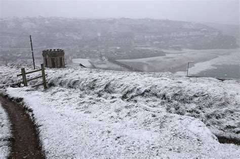 Cornwall snow in pictures as wild seas, stormy skies and crisp snow transform the county ...