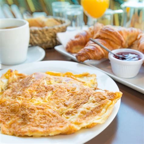 Making Breakfast Special: Traditional French Omelet with Emmental Cheese - Baked Chicago