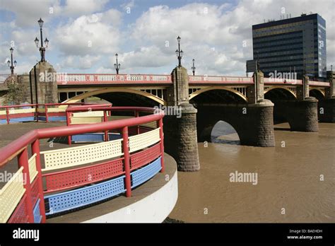 City of Newport, Wales. The redeveloped Newport Riverside promenade with Newport Bridge in the ...