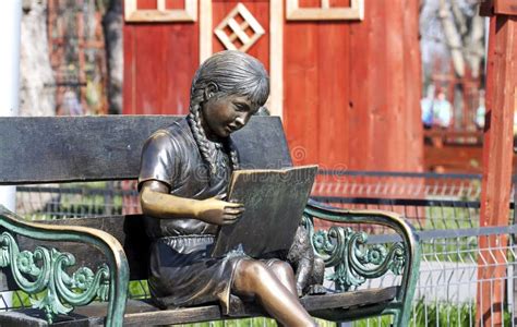 Little Girl Reading Book Statue Stock Photos - Free & Royalty-Free ...