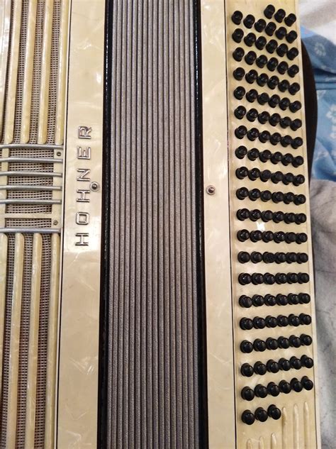 Can anyone tell me how to play this type of bass buttons? : r/Accordion