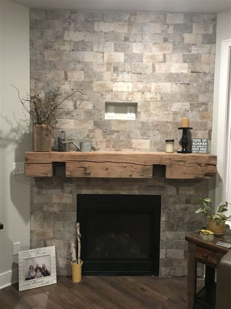 My tile brick fireplace with barnwood mantle | Brick fireplace, Living ...