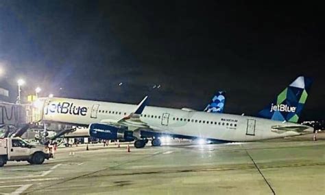 JetBlue A321 Tips Back On Tail At JFK