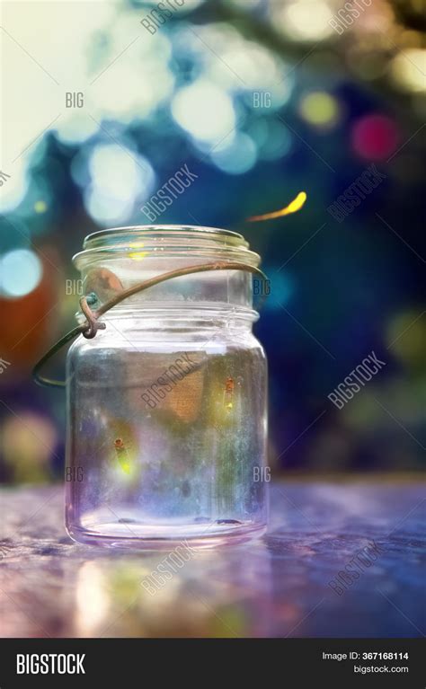 Fireflies In A Jar Wallpaper