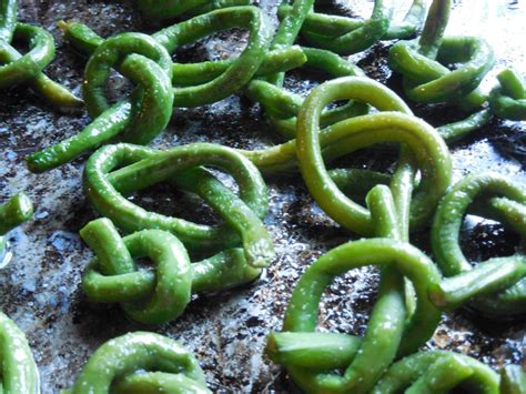 Roasted yardlong bean knots Asian Long Bean Recipe, Long Green Bean Recipes, Garden Vegetable ...