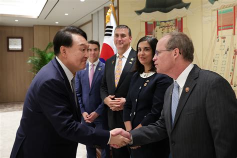 President Yoon Suk Yeol, left, meets with delegates from the U.S. House ...