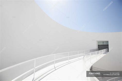 Modern architecture, elevated walkway leading to doorway — condominium, copy space - Stock Photo ...