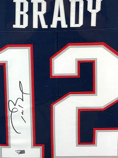 Tom Brady Autographed New England Patriots Navy Nike Jersey Framed