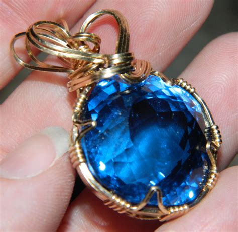 Blue gemstone pendant by DPBJewelry on DeviantArt