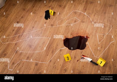 chalk outline and knife in blood at crime scene Stock Photo: 165654961 - Alamy