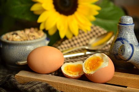 Royalty-Free photo: Boiled egg on plate beside spoon | PickPik