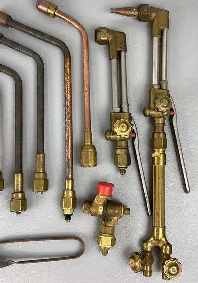 Group of Victor torch parts and tips - Schneider Auctioneers LLC