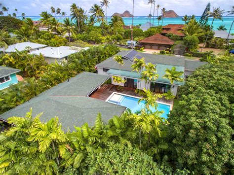 Sprawled across from the famed Lanikai Beach, this estate offers the ...