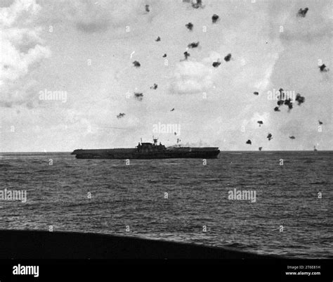 USS Hornet (CV-8) listing after the final the Japanese attack during the Battle of Santa Cruz ...