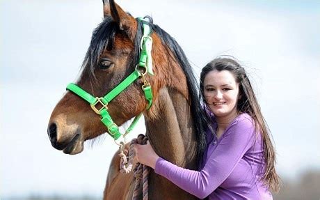 Teenager lucky to be alive after horse kicks her in head