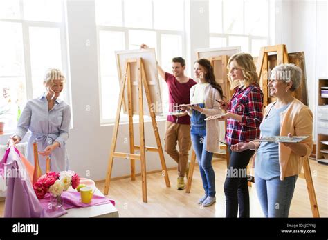 students and teacher with still life at art school Stock Photo - Alamy