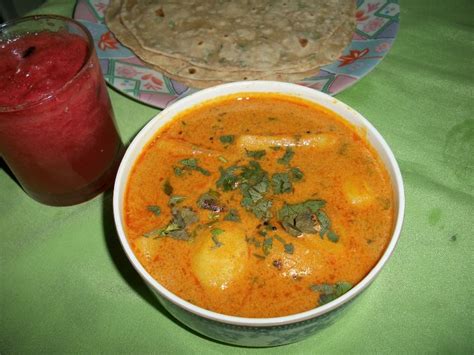 Aloo Ki Sabzi / Aloo Sabji / Potatoes Cooked in Gram flour & Curd Sauce - Best Combo for Roti ...